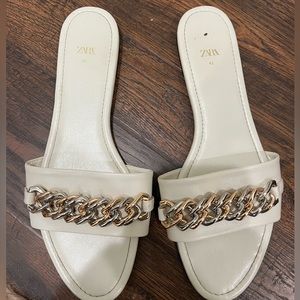 Zara white flat sandals.